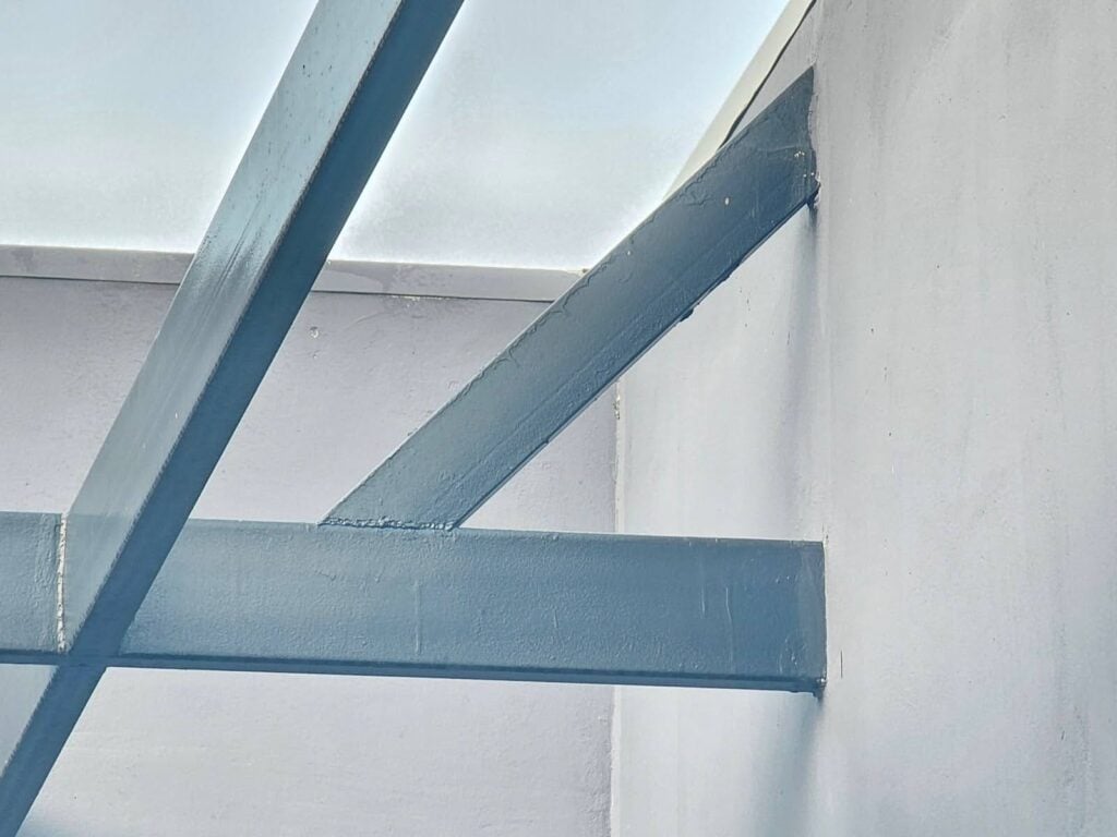 Architectural view of Tube Steel Pergola at rooftop seating area