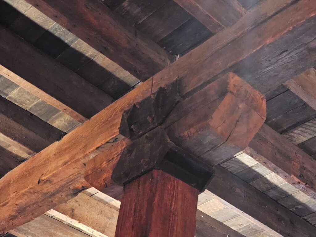 Close-up of beam bearing joint with metal support