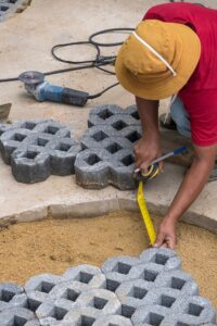 dupont decks patios builders in Washington DC installing paver and concrete patio