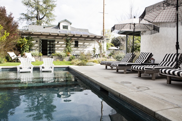 Custom-designed pool patio for Rockville homes showcasing proper drainage and stylish layout