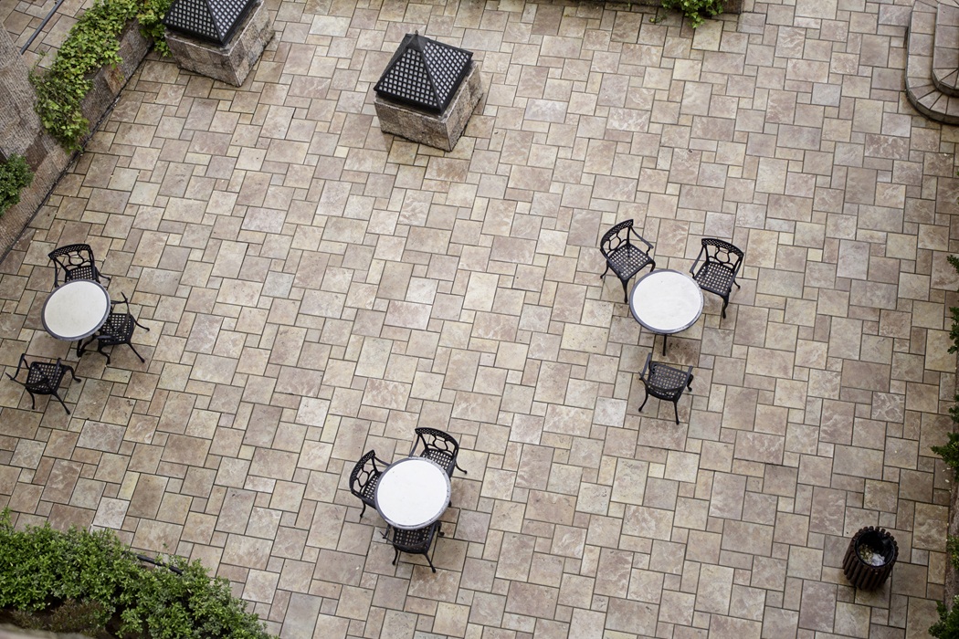 Bethesda homeowner preparing backyard for new patio installation with landscaping work