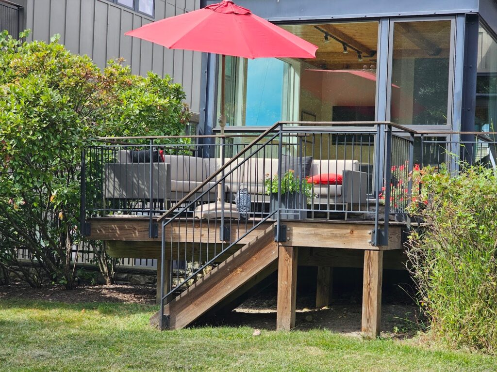Metal Handrails on Wood Decks - Part I 1 Metal handrails installed on a wood deck