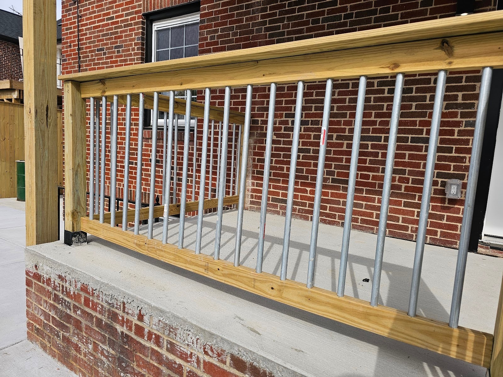 Modern deck guardrail with electrical tubing balusters