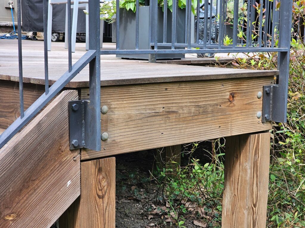 Metal Handrails on Wood Decks - Part I 3 Modern wood deck with black metal railing design
