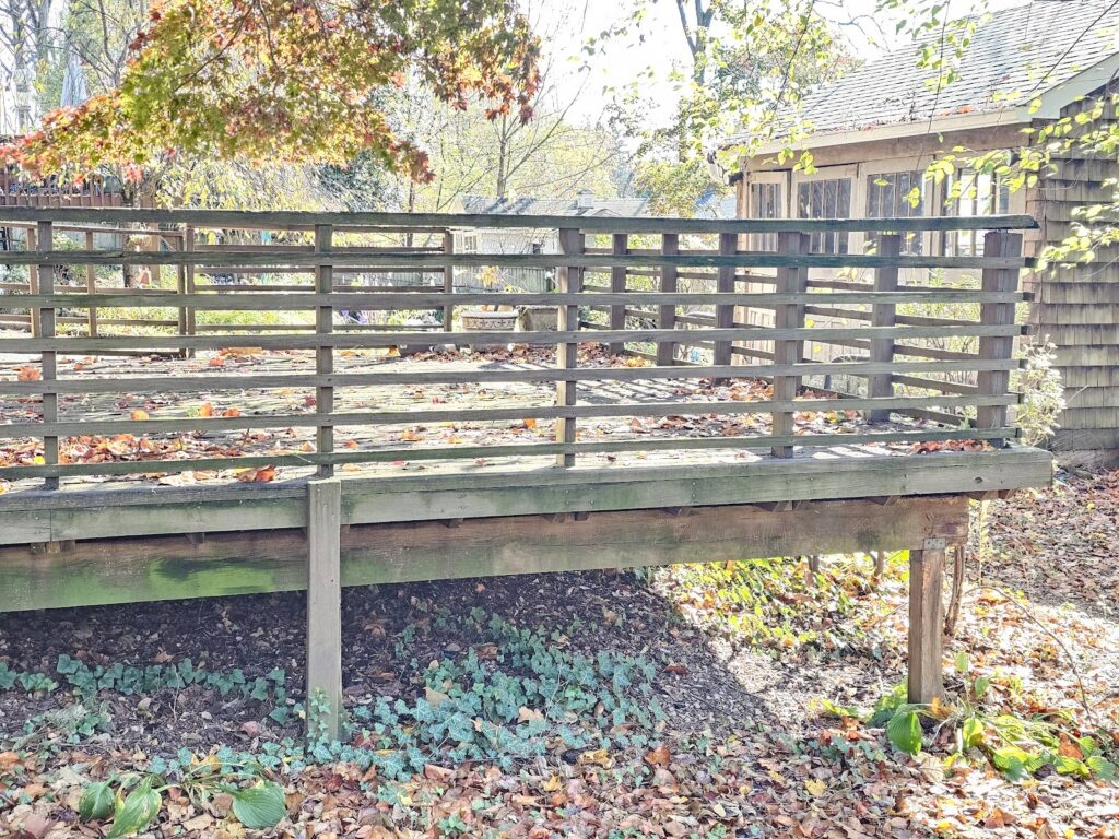 Finished low deck built on uneven sloped terrain