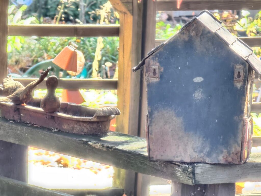 decorative elements at the bench on the side of this deck