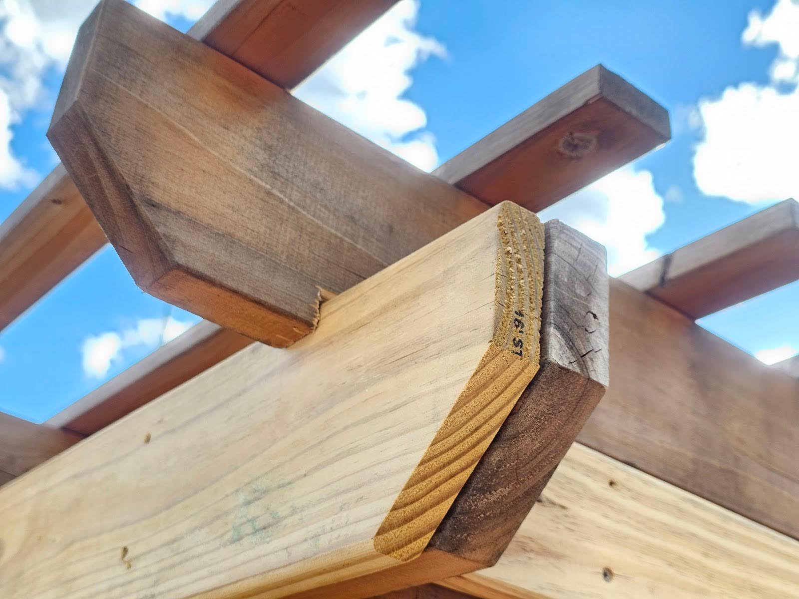 beams at the end of the pergola edge