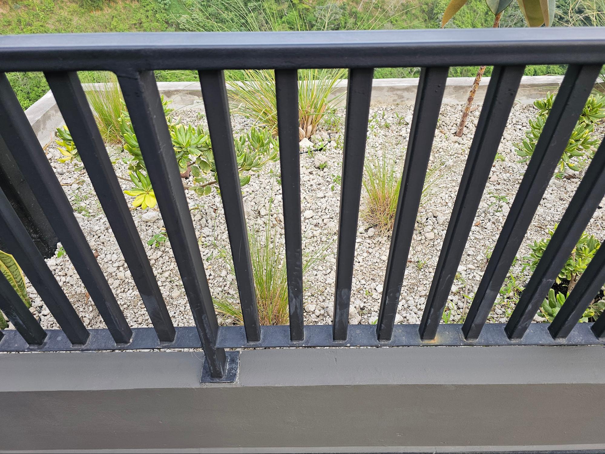 Steel Guardrail on a Kneewall 2 Interior space below the balcony