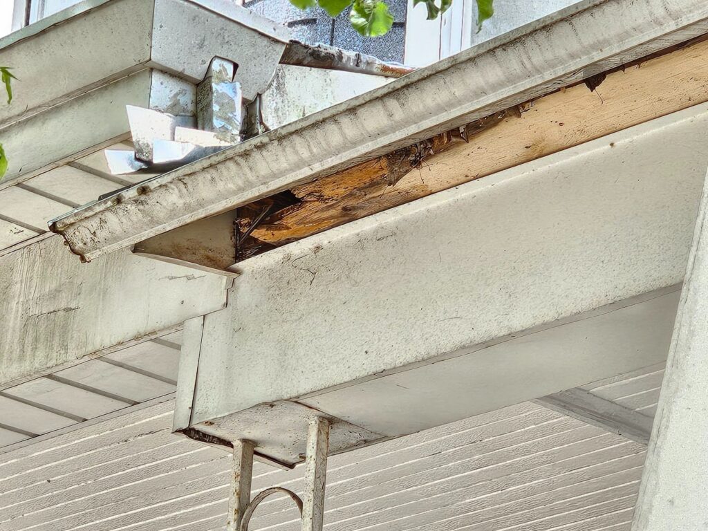 Front porch fascia and soffit installation on residential home exterior