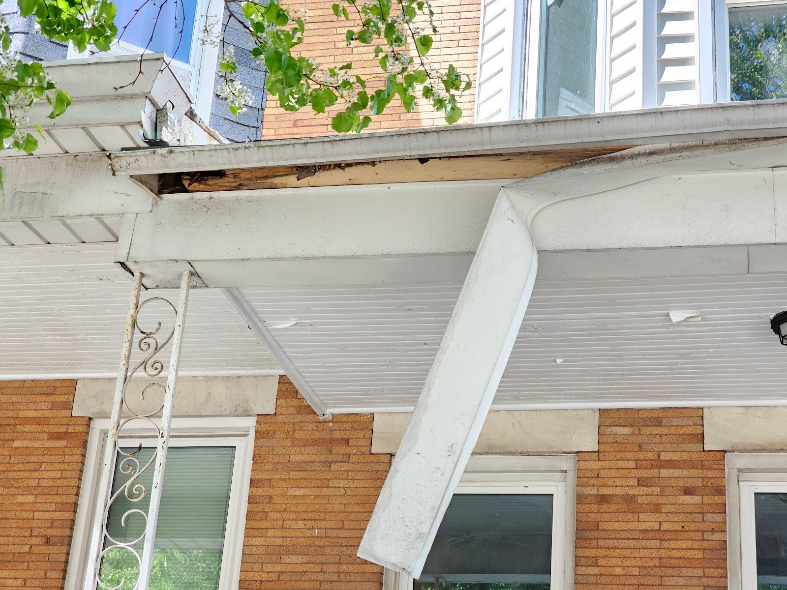 damage and deterioration front porch roof seen in Washington DC