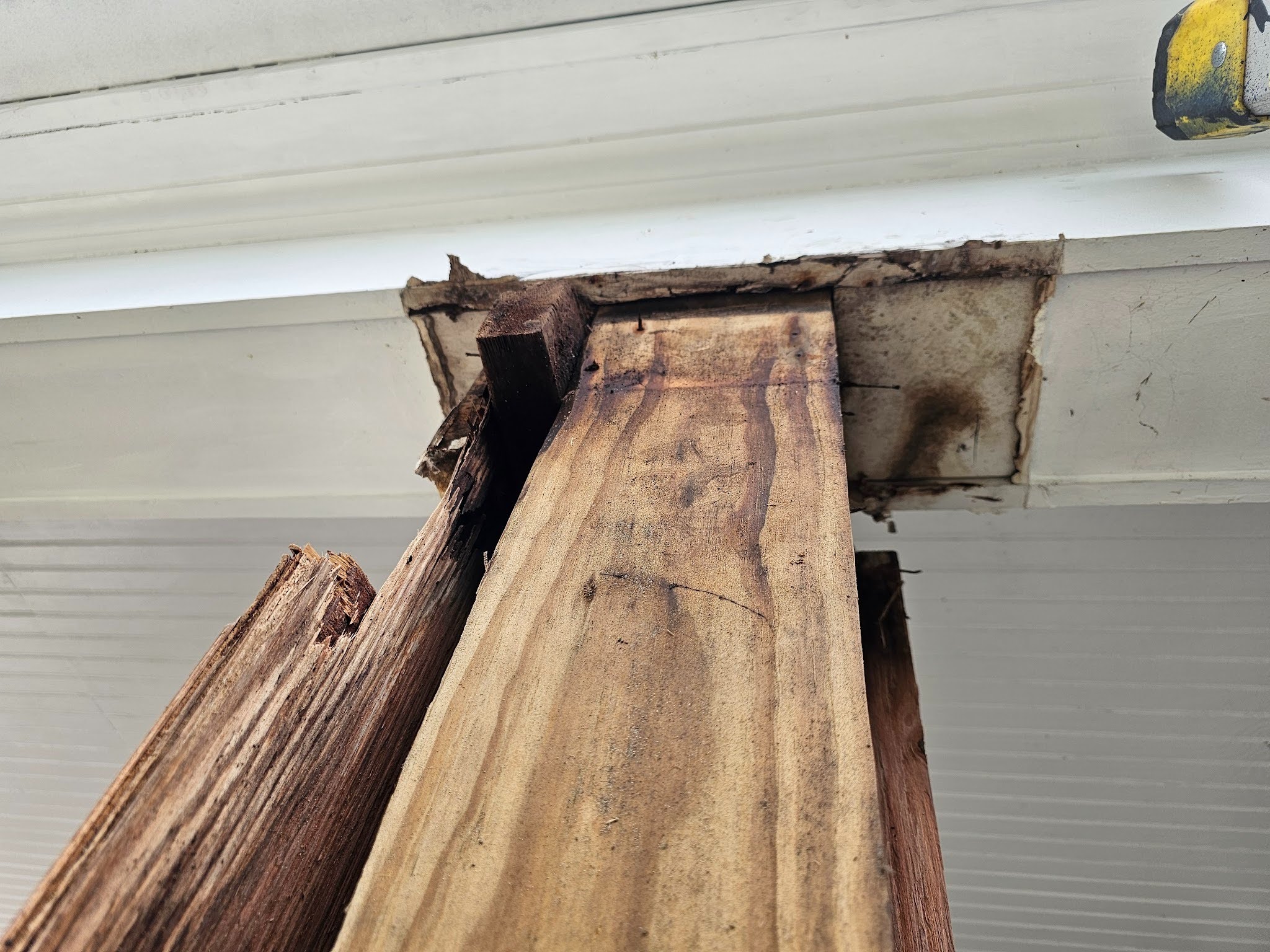 front porch is built with 4x4 wood posts