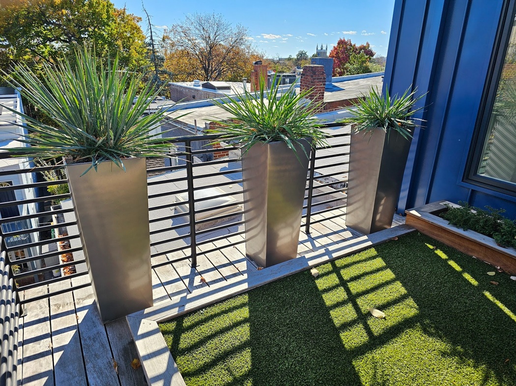 Three tall planters