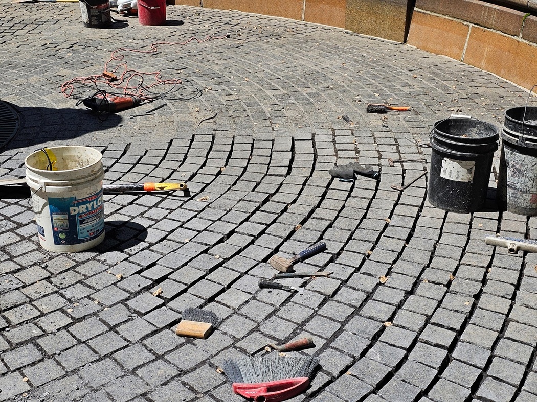 Raking tools remove deteriorated old mortar