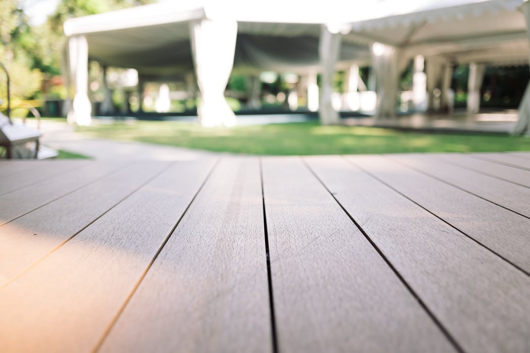 Beautiful composite decking installed behind a Washington, DC home, showcasing a low-maintenance outdoor living space that adds long-term property value