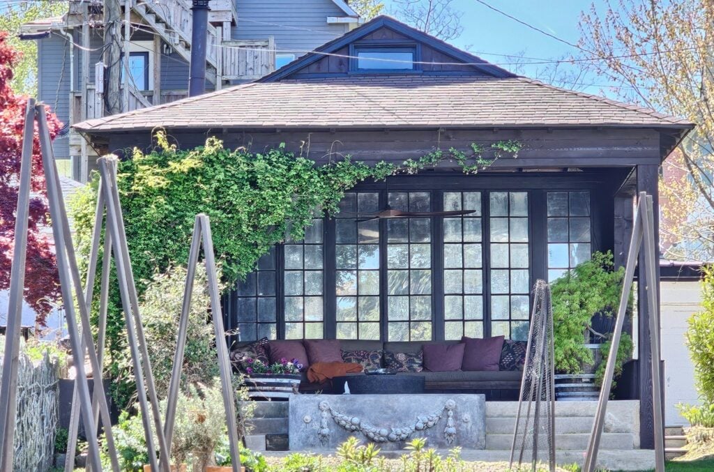 Well-designed covered outdoor seating area for enjoying a comfortable backyard space