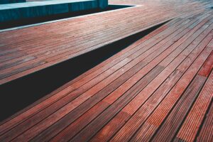 Bethesda, MD homeowner comparing deck resurfacing and replacement options