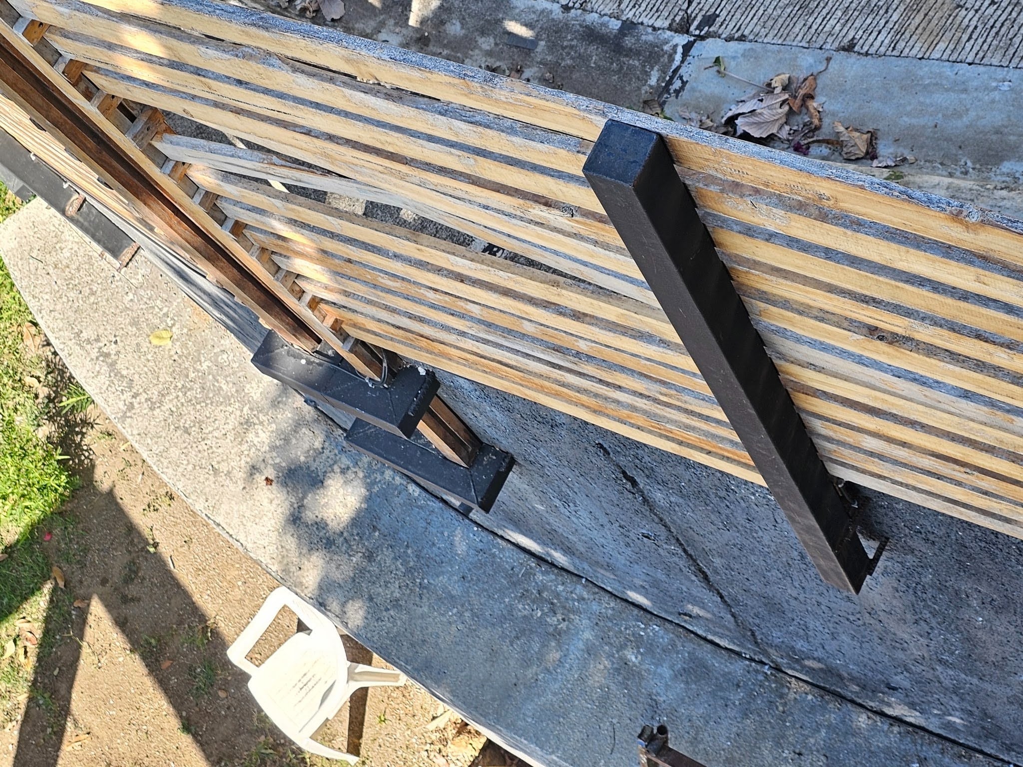 anchored with concrete reinforcement bars