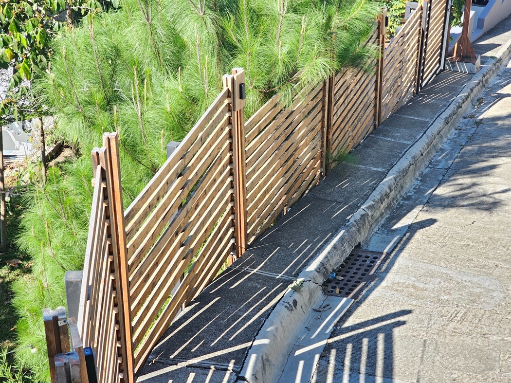 Fence on a Retaining Wall - Part I 2 structural backbone post of the retaining wall